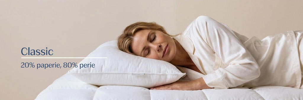 Žena odpočívajúca na luxusnom vankúši plnenom husacím perím a páperím, relaxačný spánok.